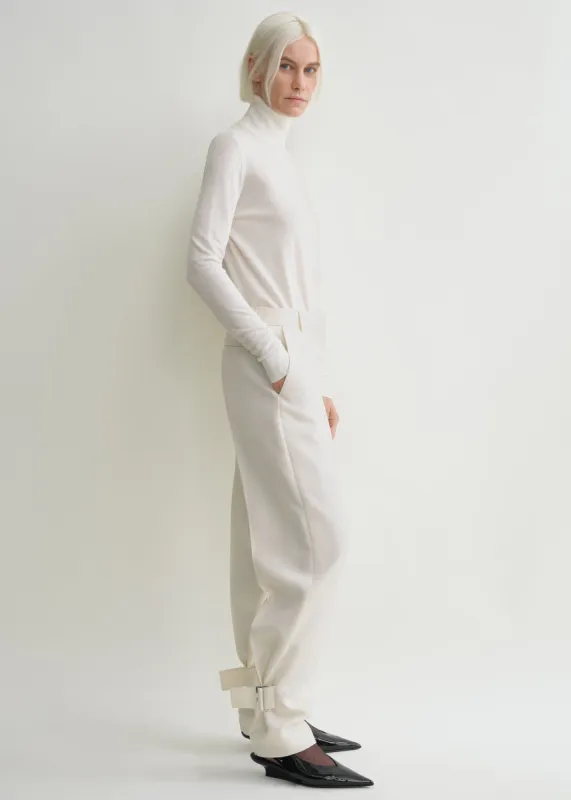 Buckled slouch trousers ecru sold by Toteme