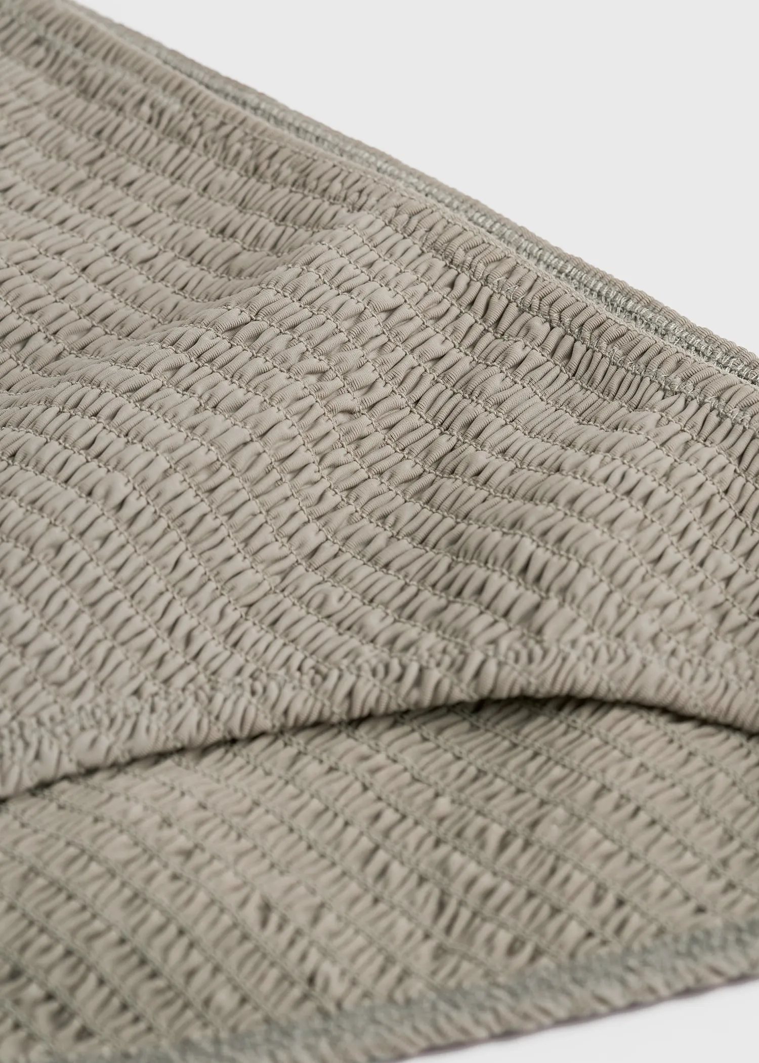 Smocked mid-rise bikini bottoms dove sold by Toteme product image thumbnail 3