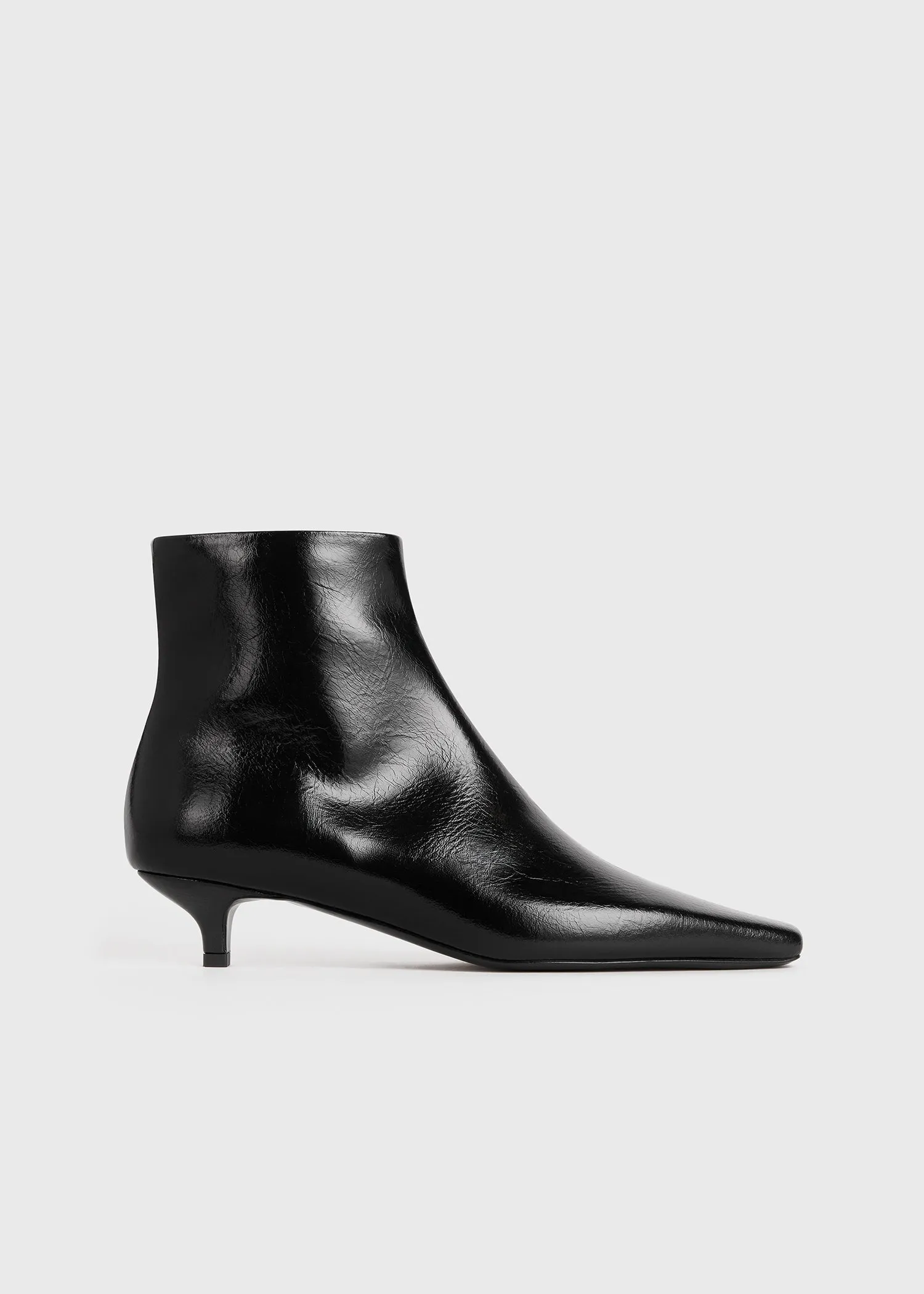 Slim patent ankle boots black sold by Toteme