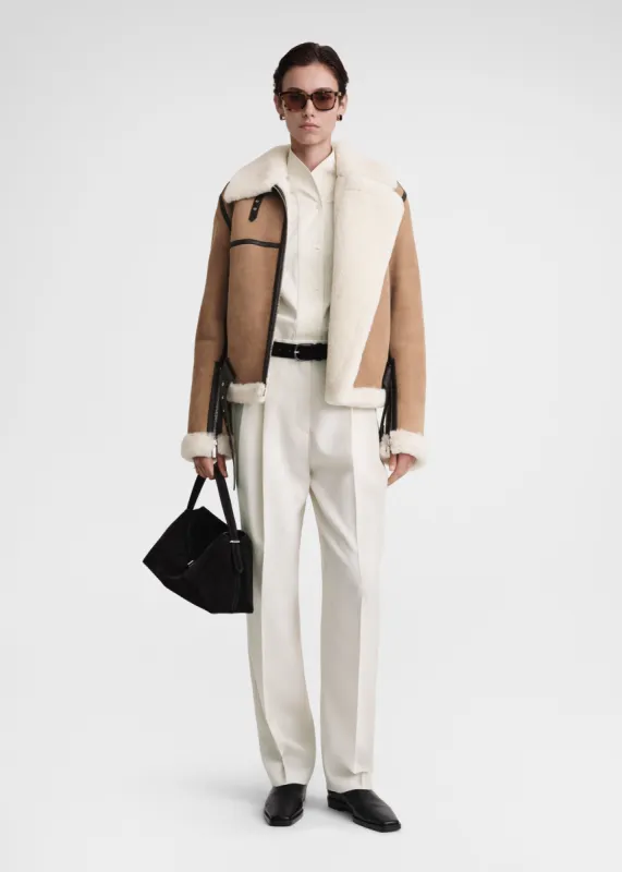 Shearling aviator jacket dark biscuit sold by Toteme