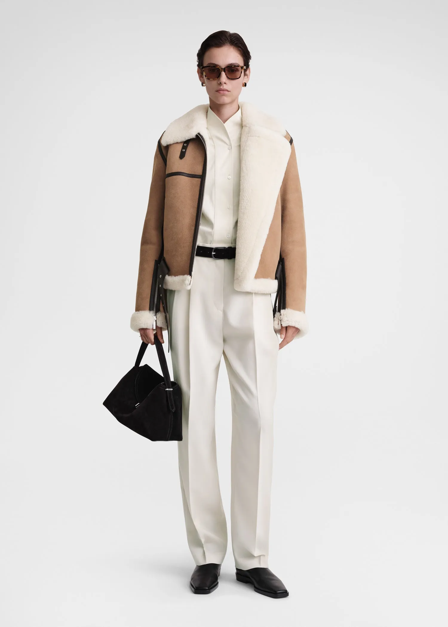 Shearling aviator jacket dark biscuit sold by Toteme