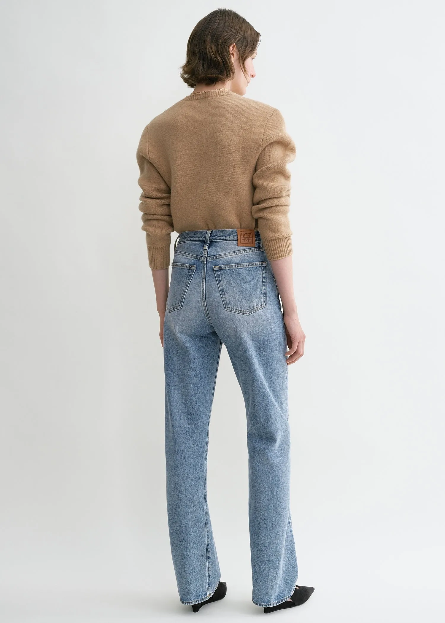 Twisted seam denim full length worn blue sold by Toteme product image thumbnail 3