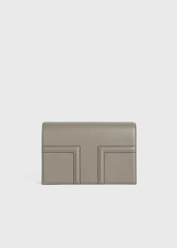 T-Flap leather bag taupe sold by Toteme