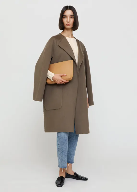 Small leather pouch harvest sold by Toteme