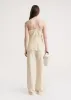 Draped twill cami top bleached sand sold by Toteme