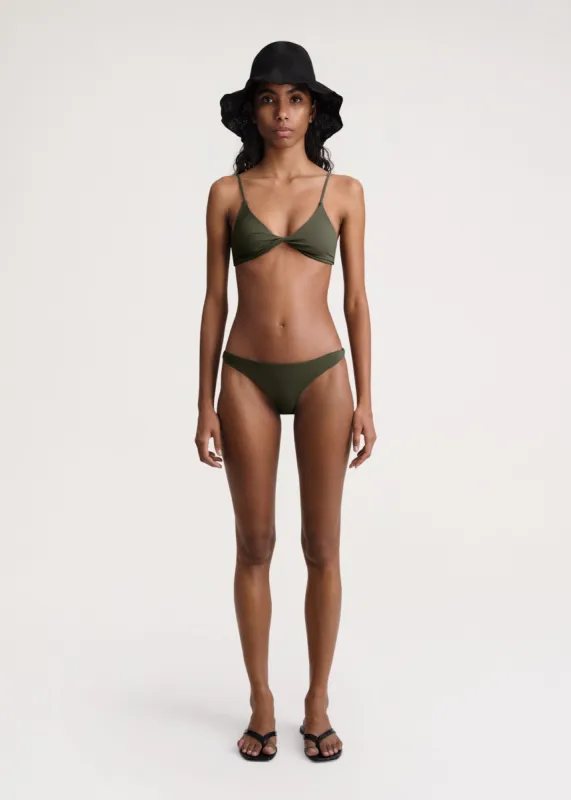 Twist-side bikini bottoms faded olive sold by Toteme