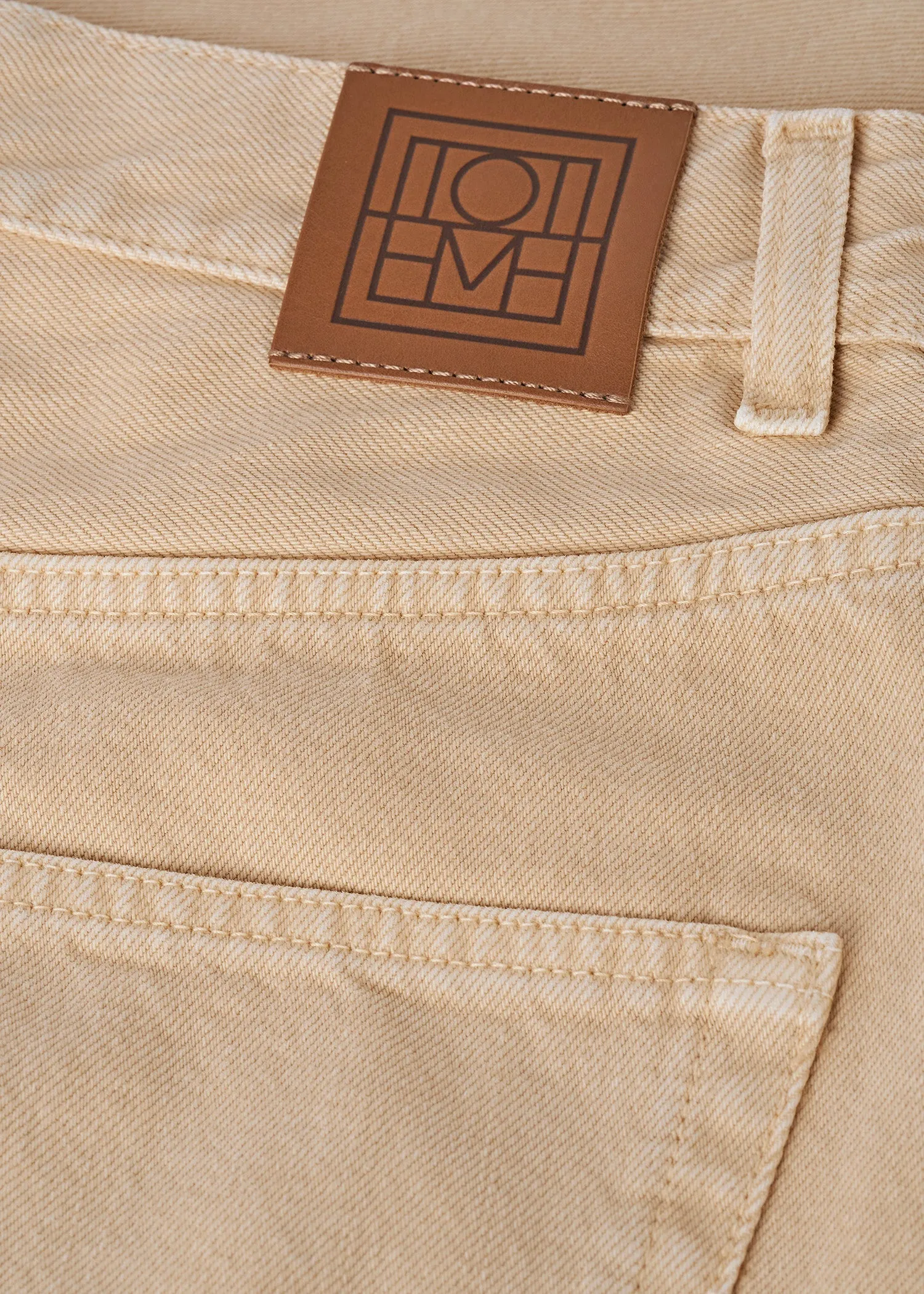 Wide tapered leg denim washed beige sold by Toteme product image thumbnail 5