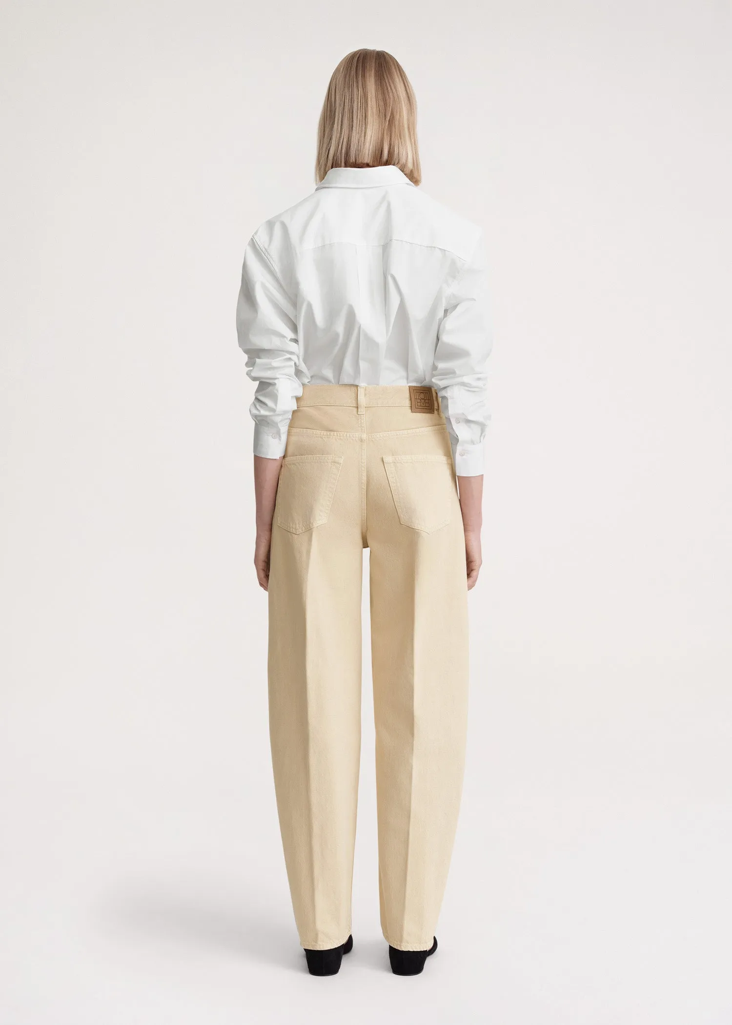 Wide tapered leg denim washed beige sold by Toteme product image thumbnail 4
