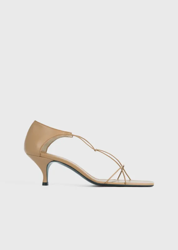 The Leather Knot Sandal caramel sold by Toteme