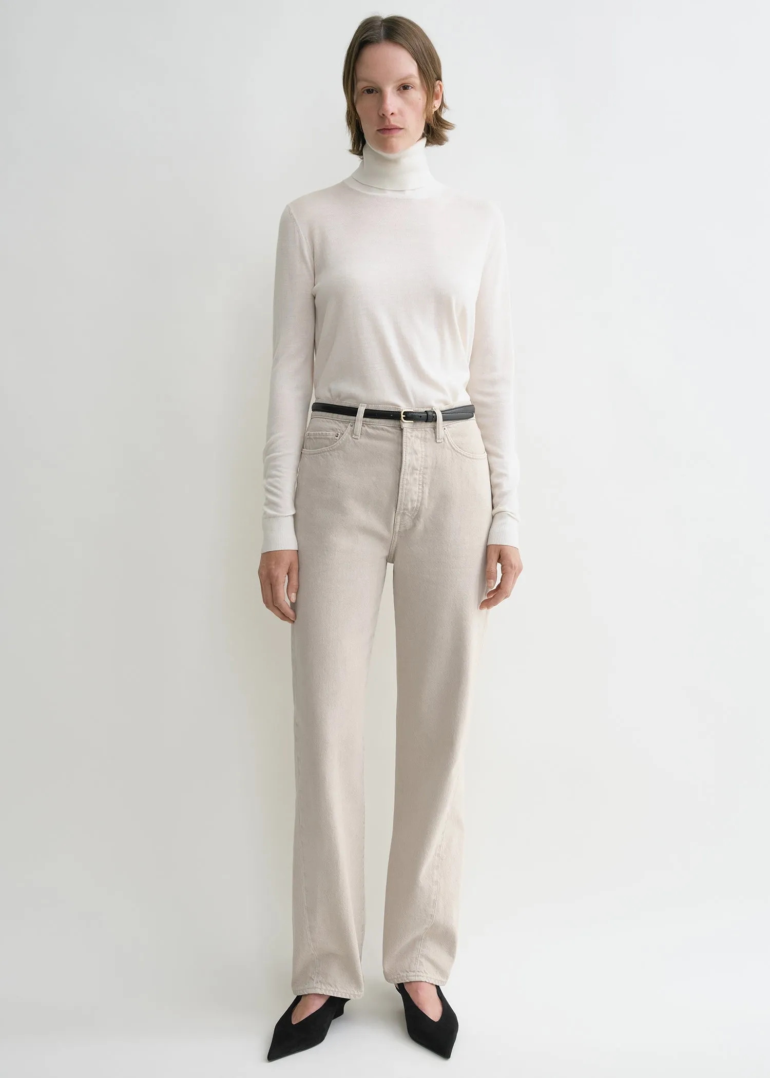 Twisted seam denim full length smoke grey sold by Toteme