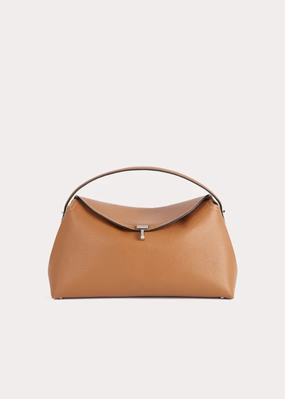 T-Lock grained-leather top handle tan sold by Toteme