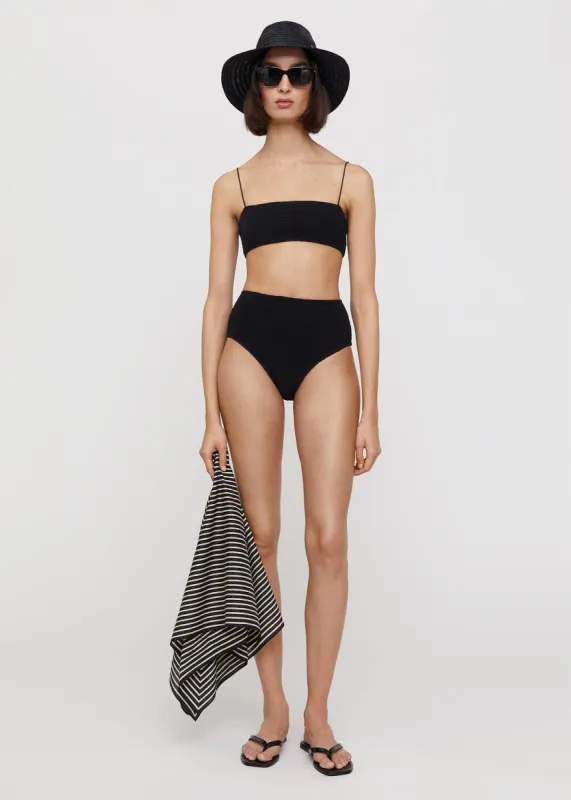 Smocked bikini bottoms black sold by Toteme