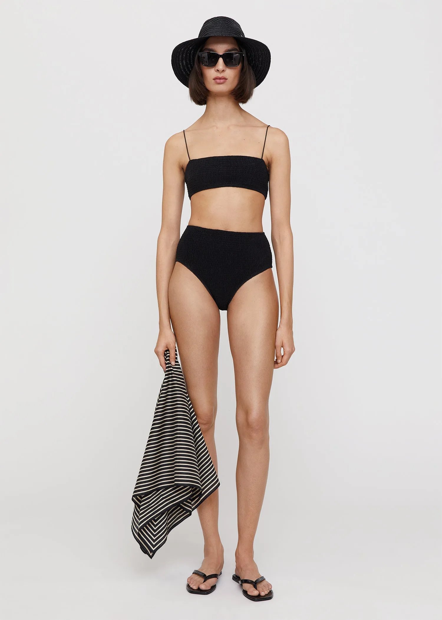 Smocked bikini bottoms black sold by Toteme