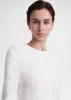 Slim chenille knit white sold by Toteme