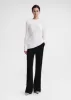 Slim chenille knit white sold by Toteme