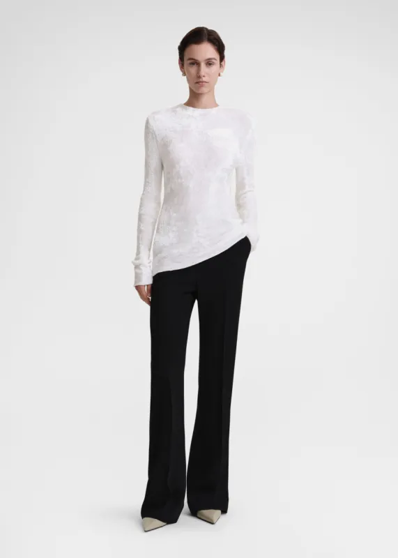 Slim chenille knit white sold by Toteme