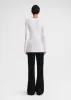 Slim chenille knit white sold by Toteme