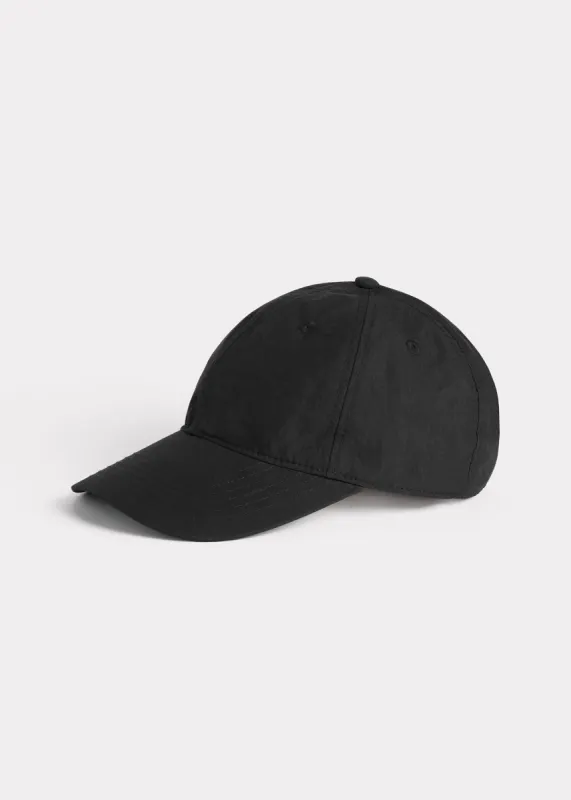Cotton cap black sold by Toteme