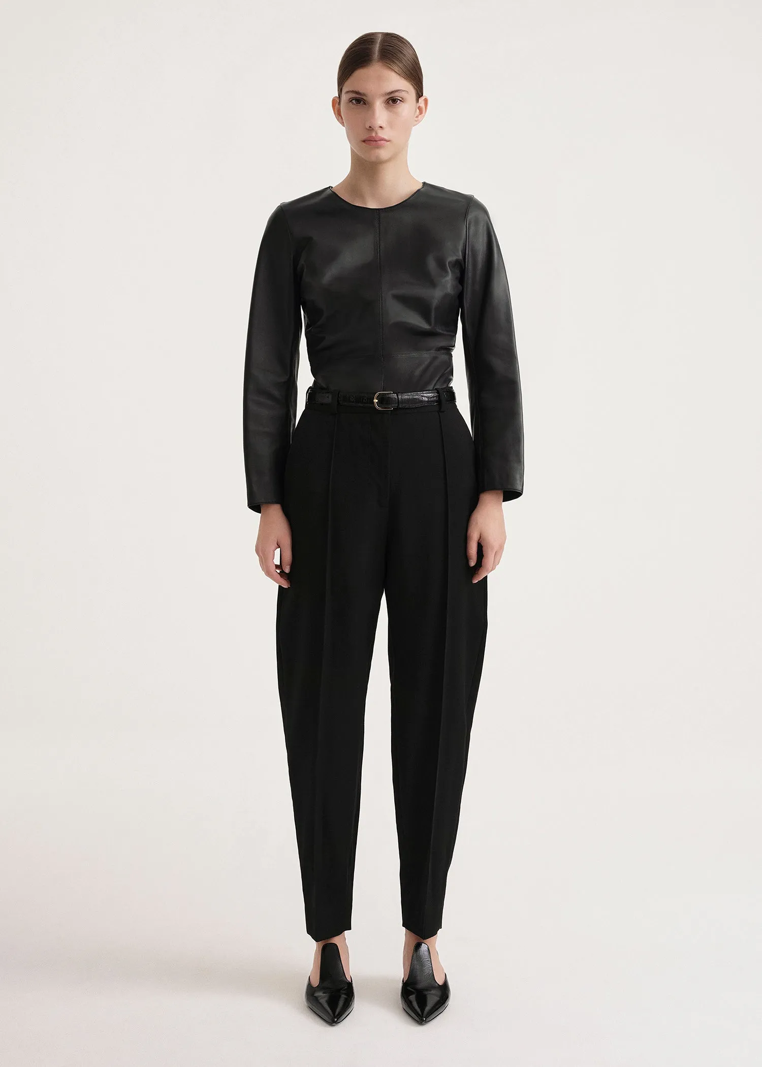Sewn pleat wool trousers black sold by Toteme