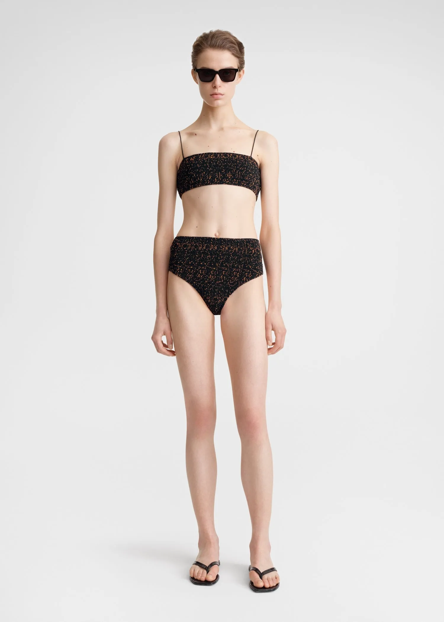 Smocked bikini bottoms tortoise sold by Toteme