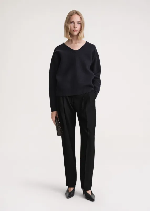 Soft felted merino knit navy made by Toteme