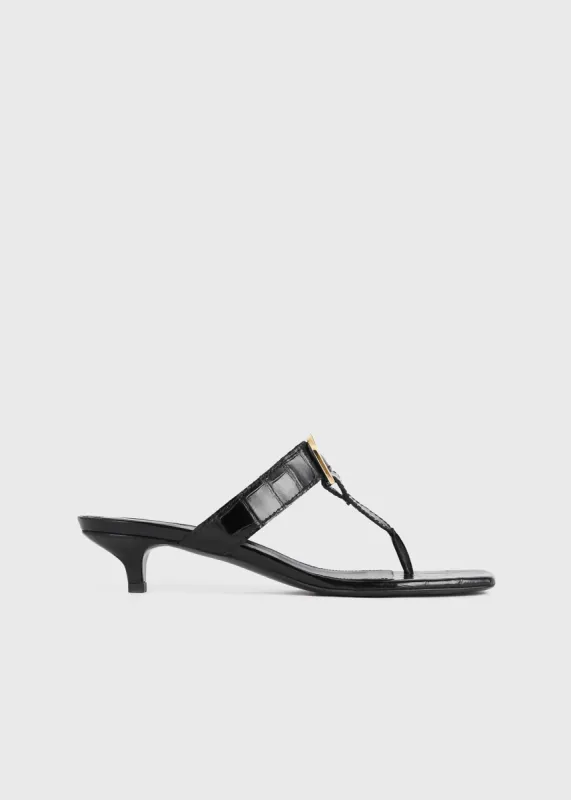 The Belted Croco Flip-Flop Heel black sold by Toteme