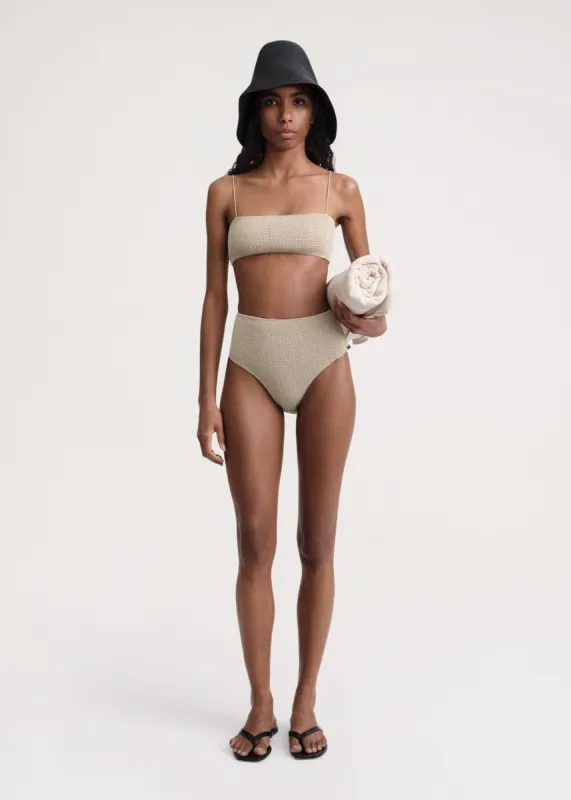Smocked bikini top overcast beige sold by Toteme
