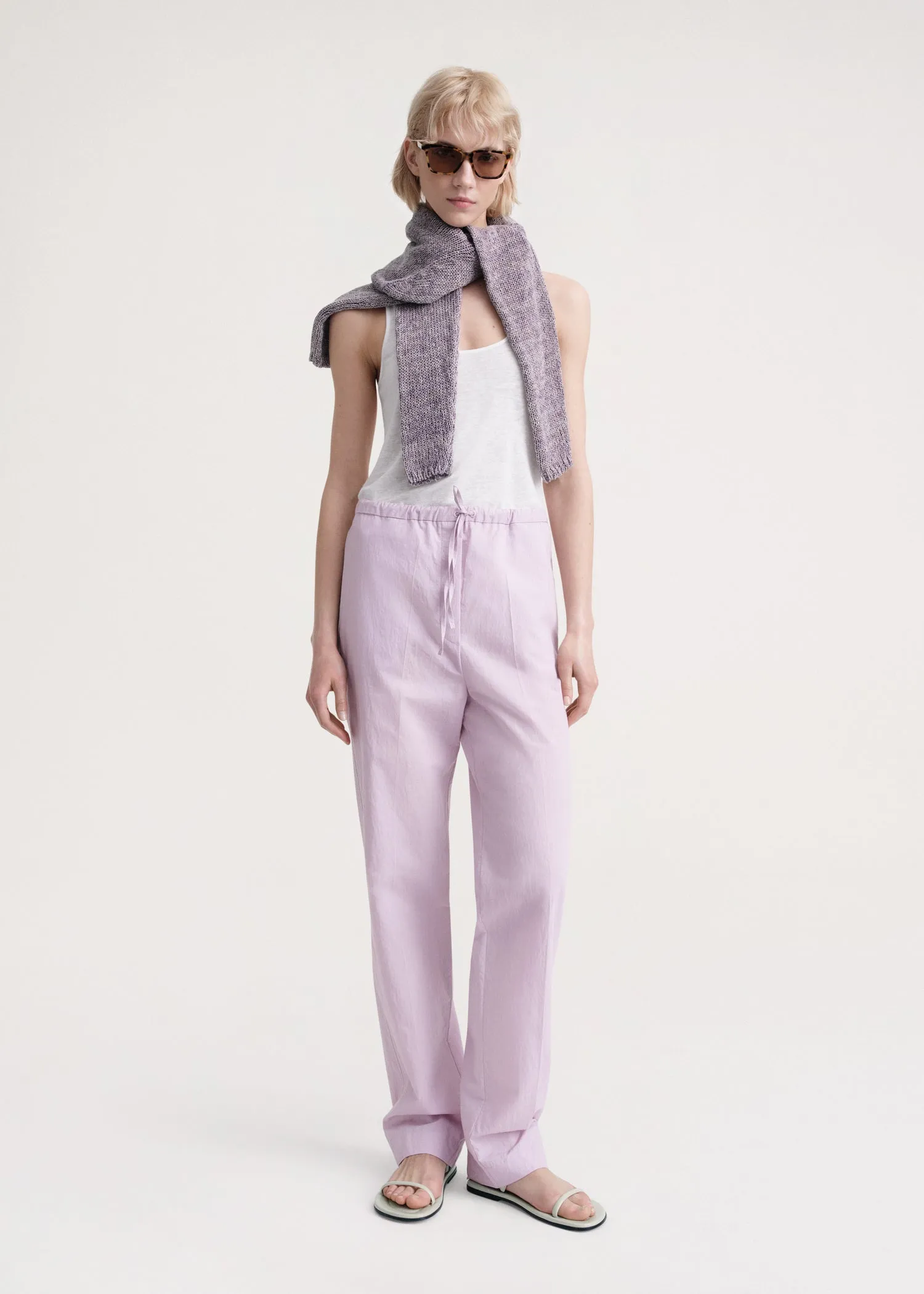 Press-creased drawstring trousers lilac sold by Toteme