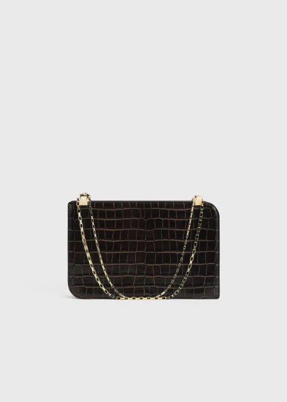 Chain bag dark brown sold by Toteme