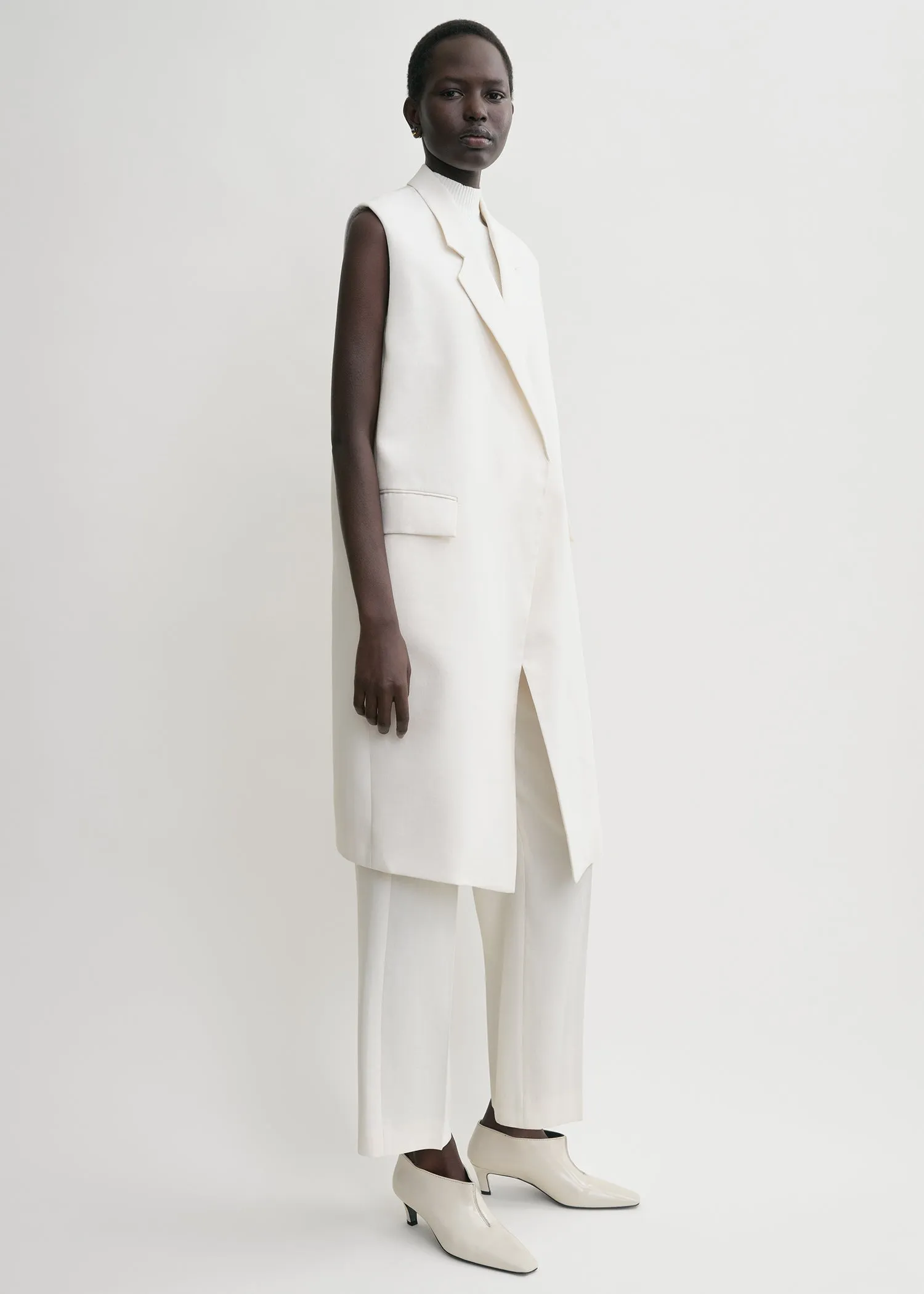 Sleeveless grain de poudre coat off white sold by Toteme product image thumbnail 2