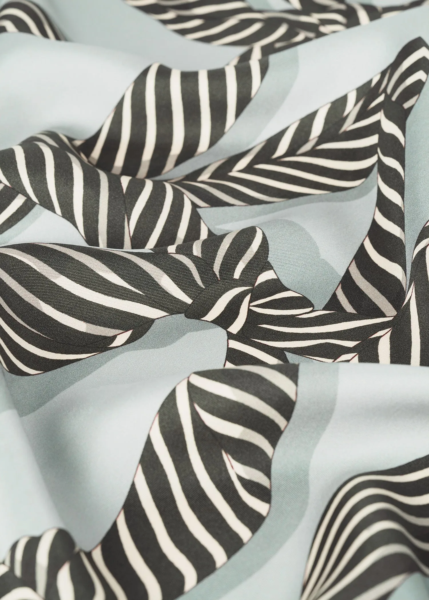 Knotted monogram silk scarf silver grey sold by Toteme product image thumbnail 4