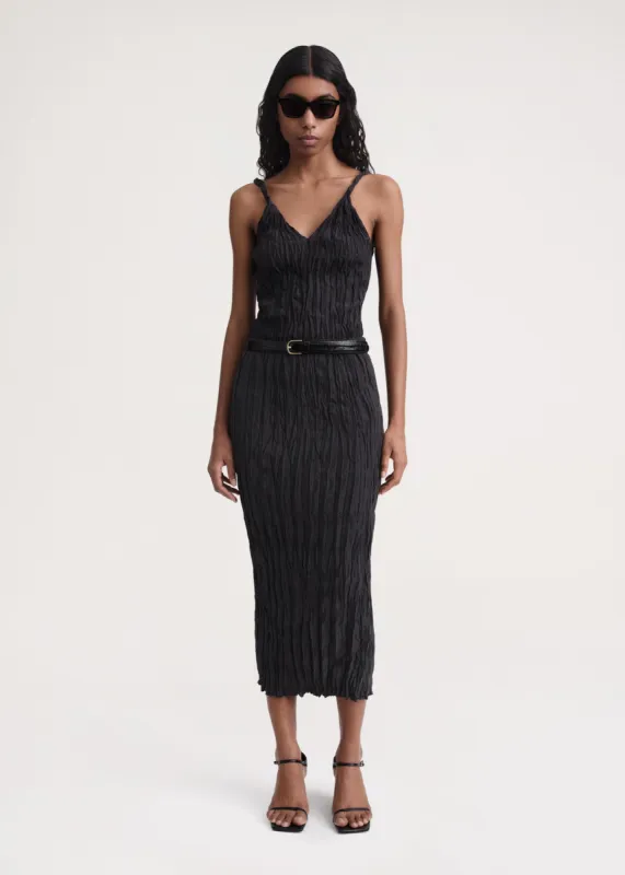 Crinkled silk midi skirt black sold by Toteme