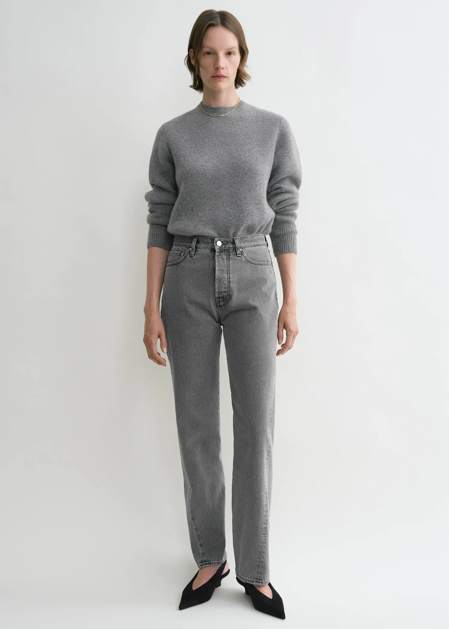 Twisted seam denim full length mid grey sold by Toteme