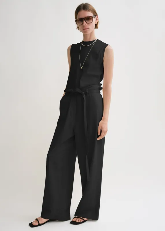 Fluid tie-waist trousers black sold by Toteme