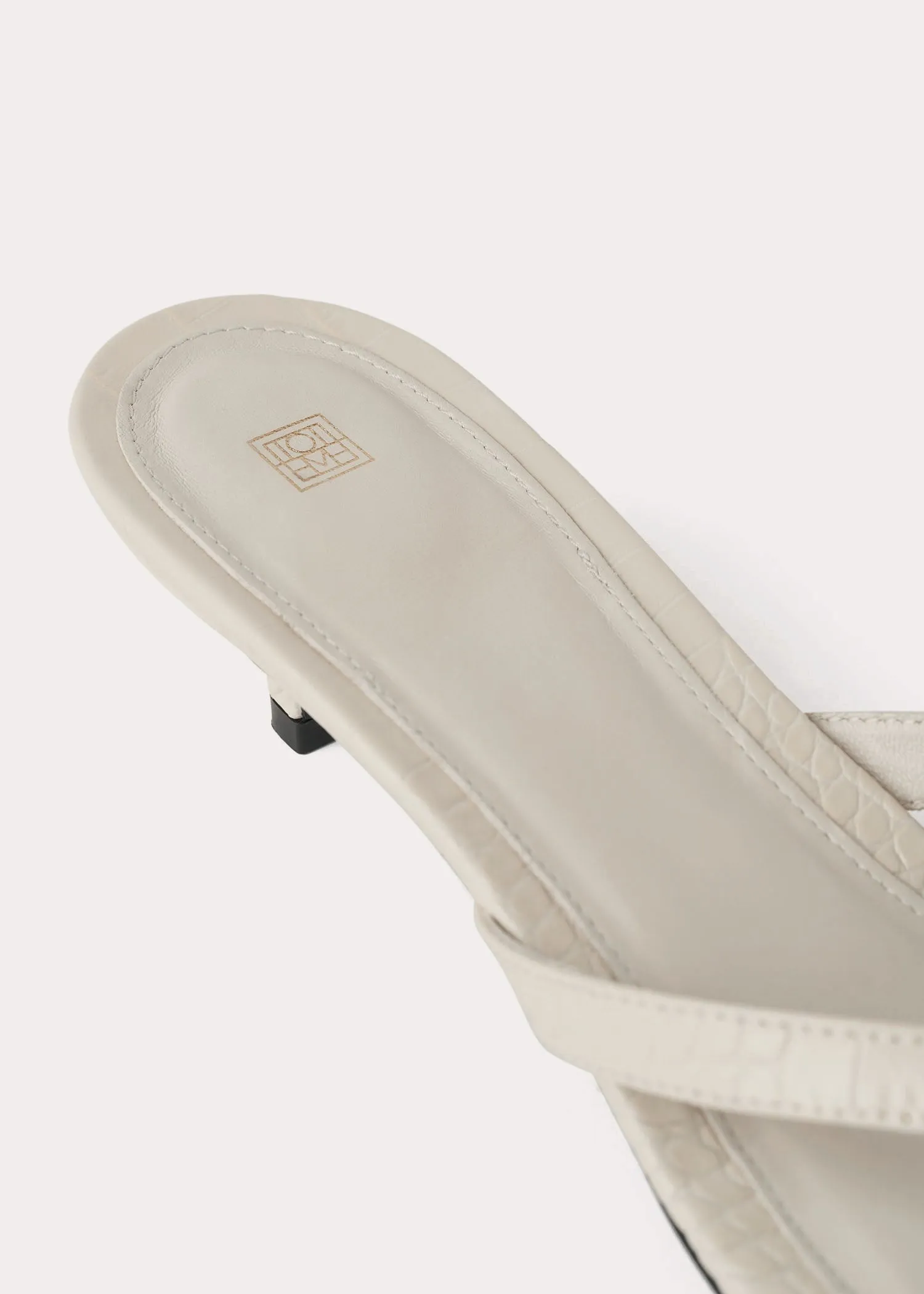 The Flip-Flop Heel sand croco sold by Toteme product image thumbnail 3