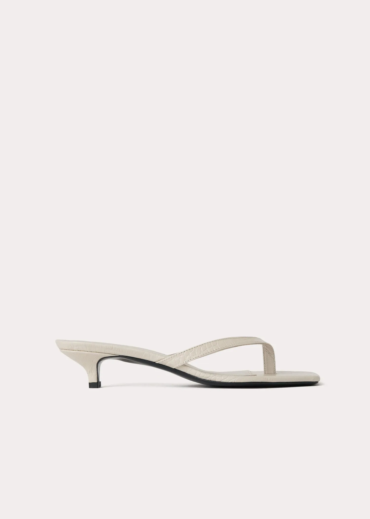 The Flip-Flop Heel sand croco sold by Toteme