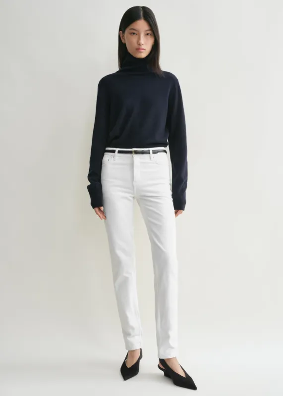 Low taper denim white sold by Toteme