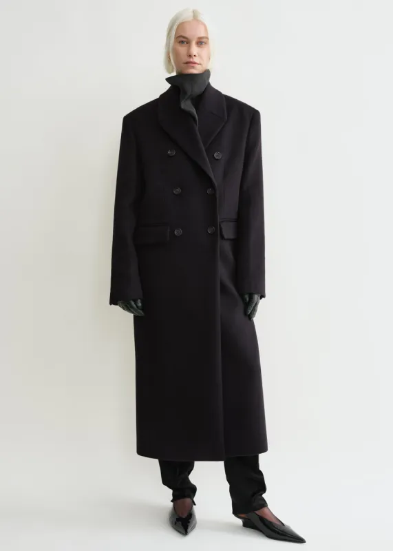 Broad coat midnight sold by Toteme
