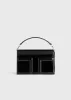 Mini T-Flap Naplack bag black sold by Toteme