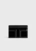 Mini T-Flap Naplack bag black sold by Toteme