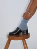 Safara Black Mule sold by Maguire Shoes