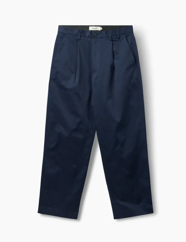 WRITER RELAXED FIT PLEATED PANTS - NAVY sold by Foret
