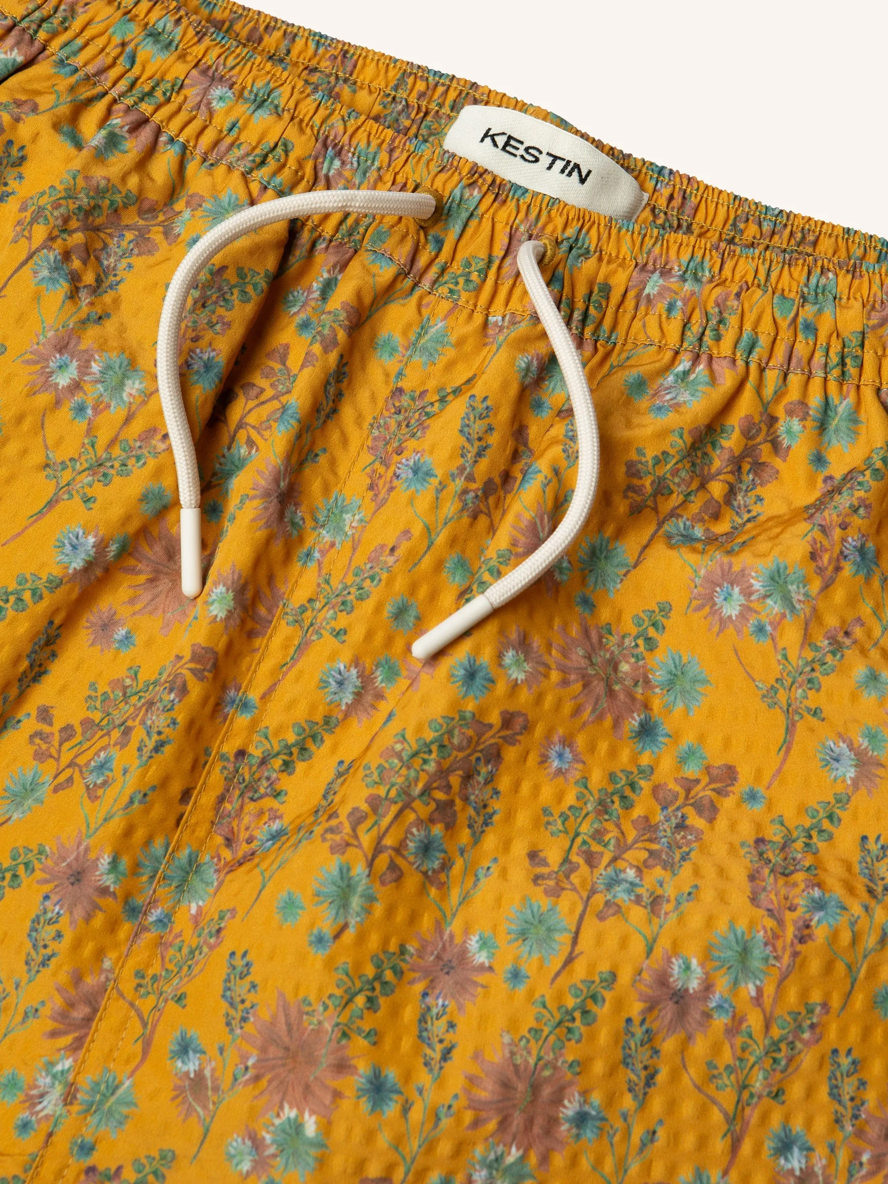 Seacliff Swim Short in Ochre Thistle Print SEAQUAL® Yarn sold by Kestin product image thumbnail 4