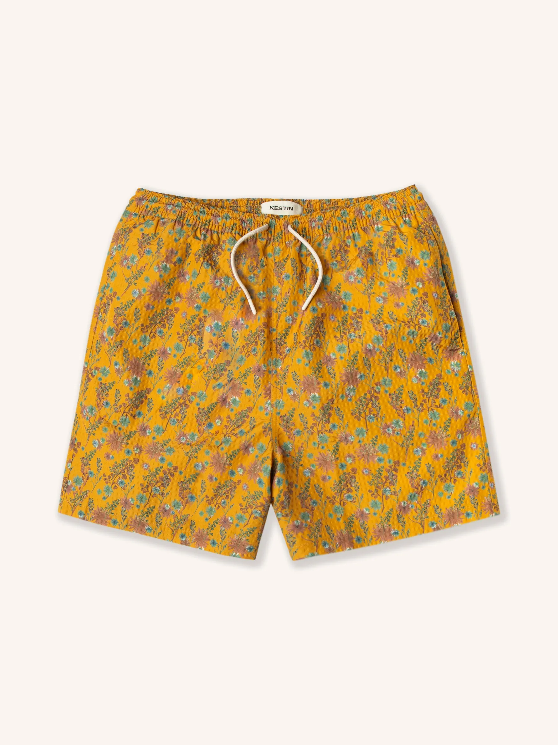Seacliff Swim Short in Ochre Thistle Print SEAQUAL® Yarn sold by Kestin