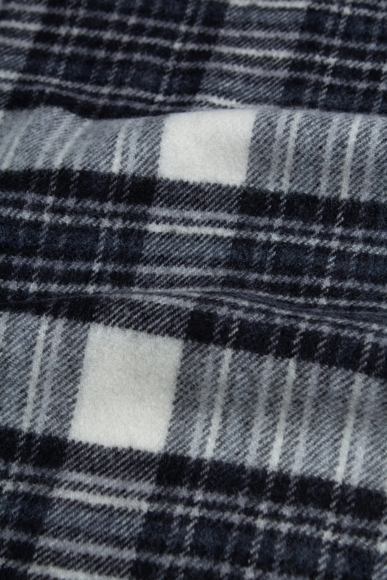 Bowhill Scarf in Black / White Check Lambswool sold by Kestin product image thumbnail 5