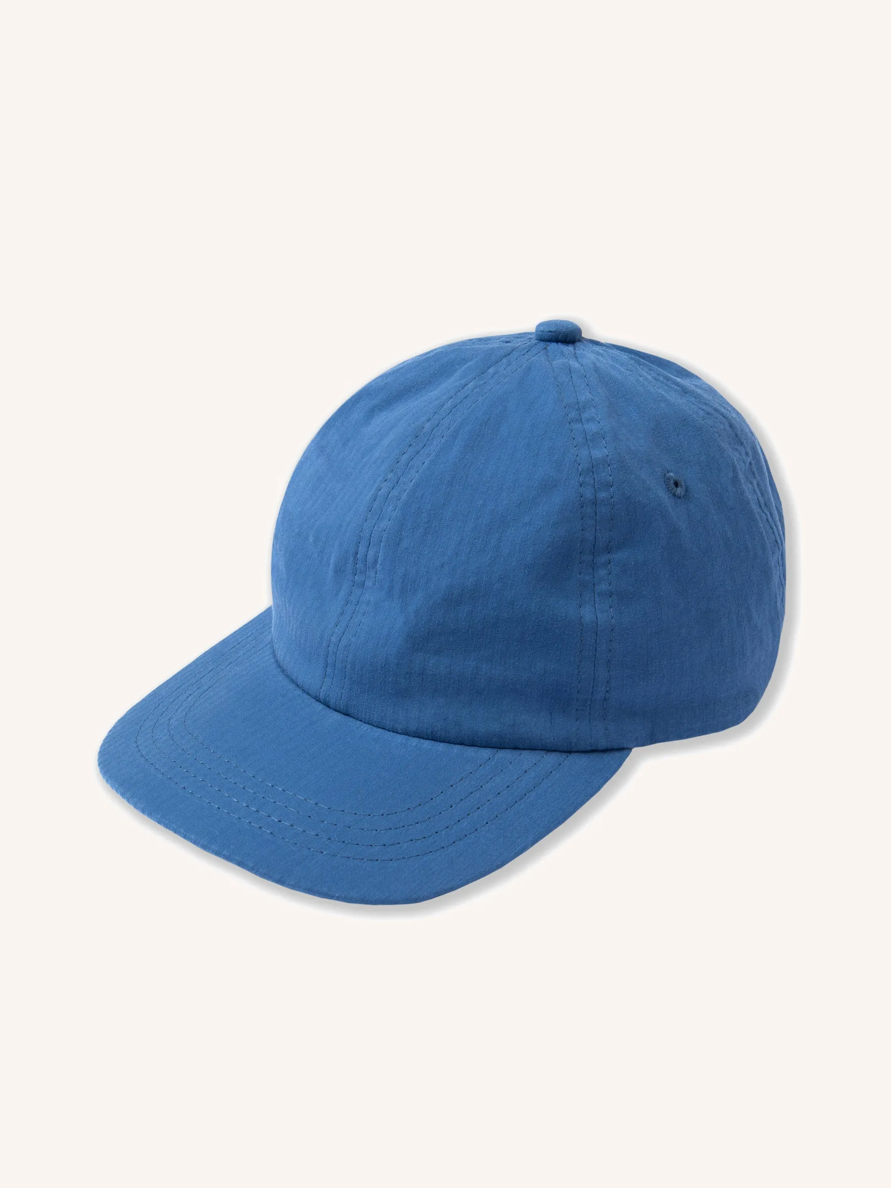 Leuchars Cap in Cobalt Seersucker sold by Kestin