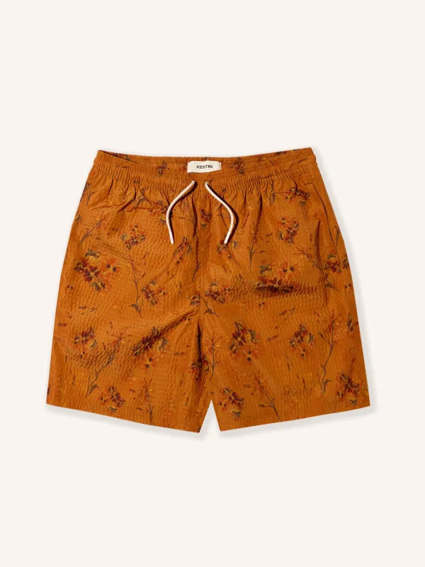 Seacliff Swim Shorts in Tangerine Floral SEAQUAL® Yarn sold by Kestin