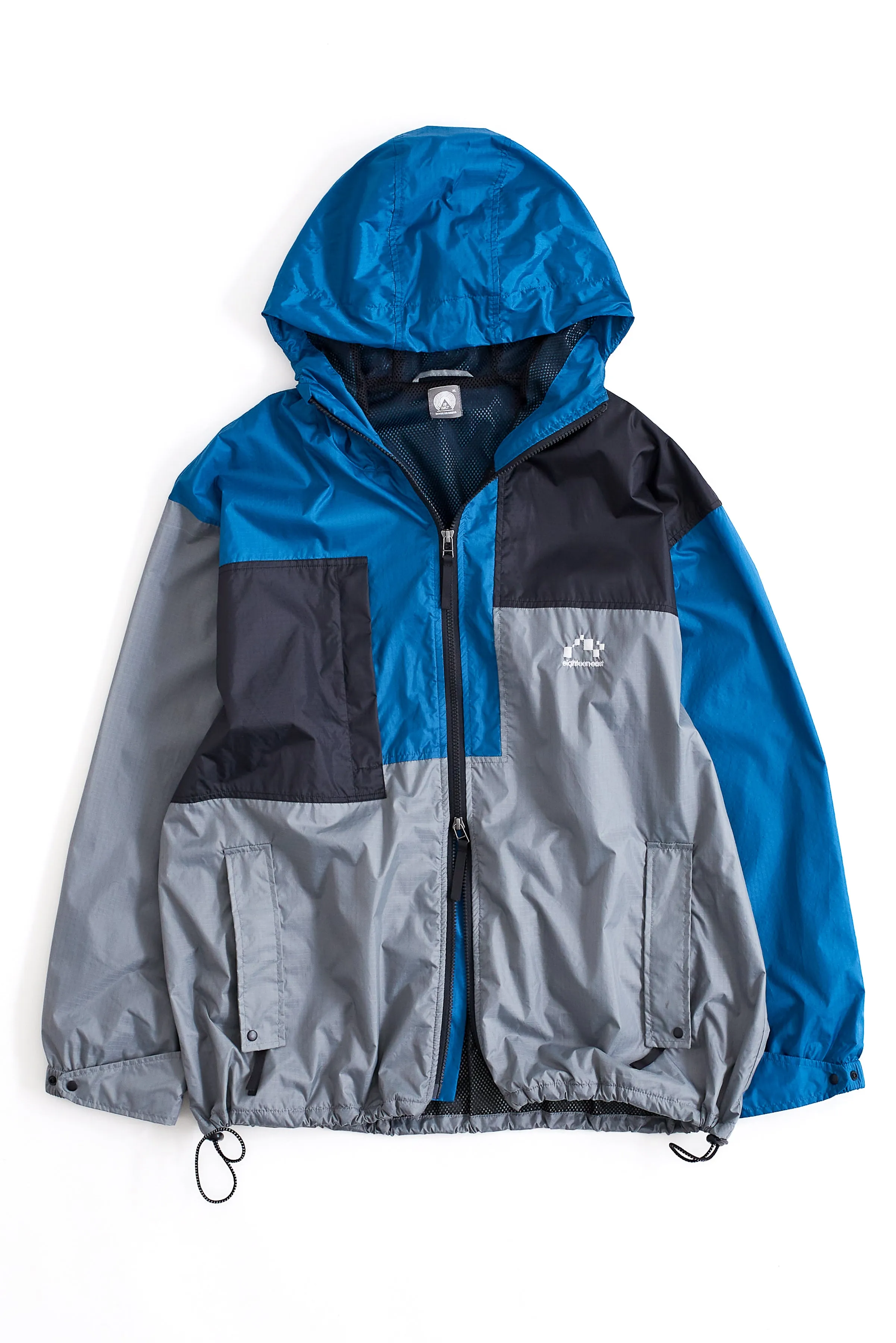NOTCH PATCHWORK HOODED WINDBREAKER - SILVER / AZURE / BLACK NYLON RIPSTOP sold by 18 East