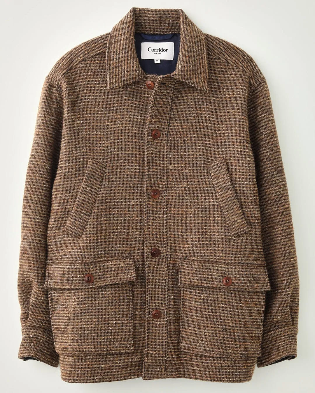 Blanket Stitch Coat sold by Corridor