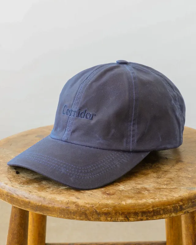 Waxed Logo Cap sold by Corridor